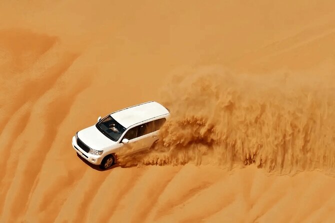 Desert Safari Redsand Dunes with BBQ Dinner in Dubai - Sunset photos on the open sand