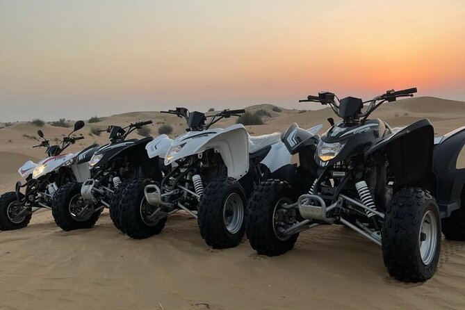 Desert Safari W/BBQ Dinner, Quad Bike, Camel Ride, & Sandboarding - Dune bashing with a steady driver