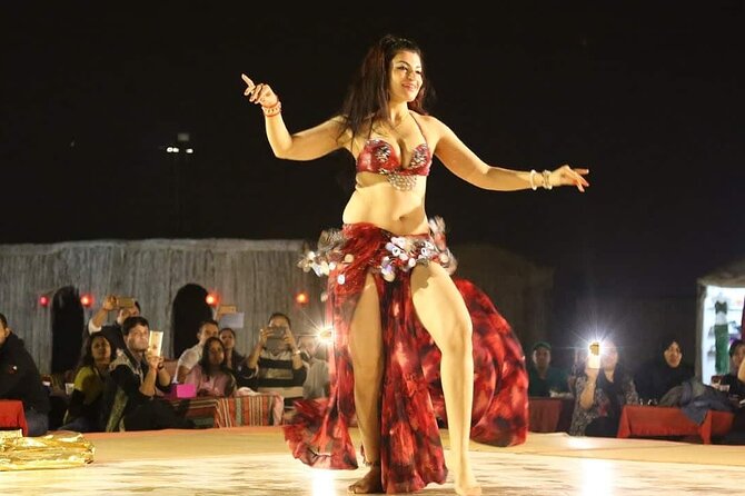 Desert Safari with BBQ Dinner, Camel Ride, Sand Board & Live Show - Tea, costumes, and a simple look at camp culture
