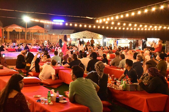 Desert Safari with BBQ Dinner from Dubai - Sandboarding, camel time, and henna