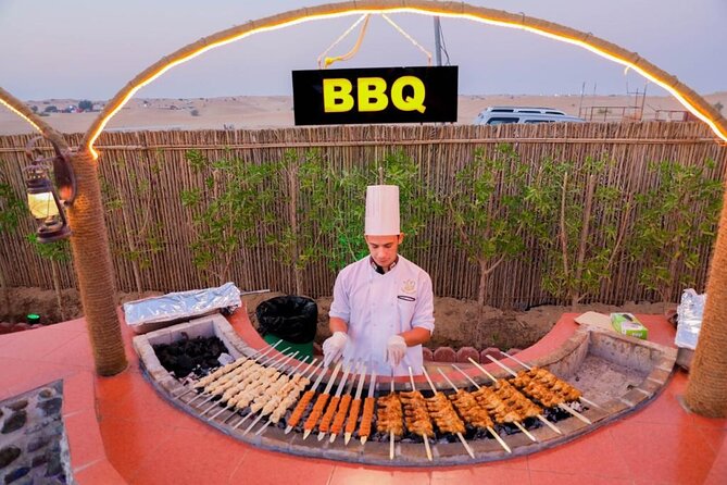Desert Safari With BBQ Dinner, Quad Bike & Camel Ride from Dubai - Camel riding, falcons, tea, and local touches