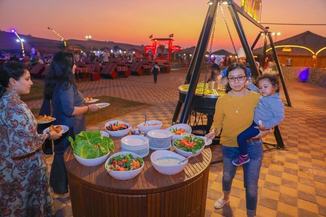 Desert Safari With BBQ Dinner, Quad Bike & Camel Ride from Dubai - Belly dancing, fire shows, and the evening program
