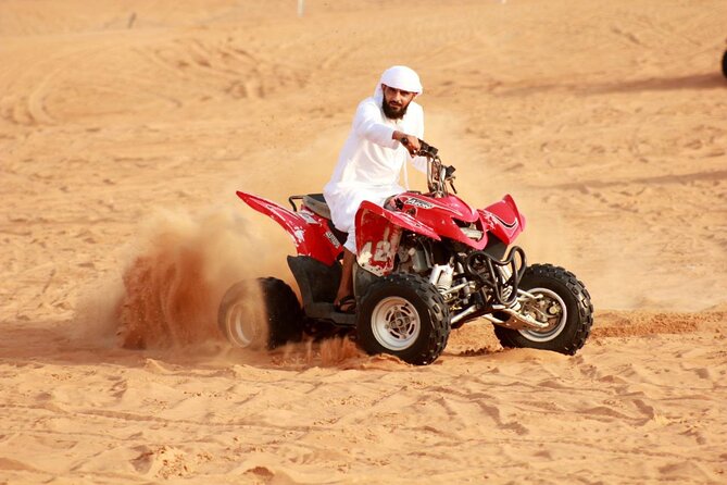 Desert Safari With BBQ Dinner, Quad Ride And And Sand-boarding - Lahbab’s red dunes and the 30-minute quad ride