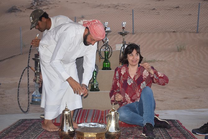 Desert Safari with BBQ Dinner - UAE Must Do - Belly dance, tannoura, and fire performance