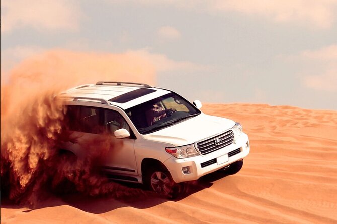Desert Safari with Quad Bike, 4x4 Dune Bashing and Camel Ride - Dune bashing in a 4x4