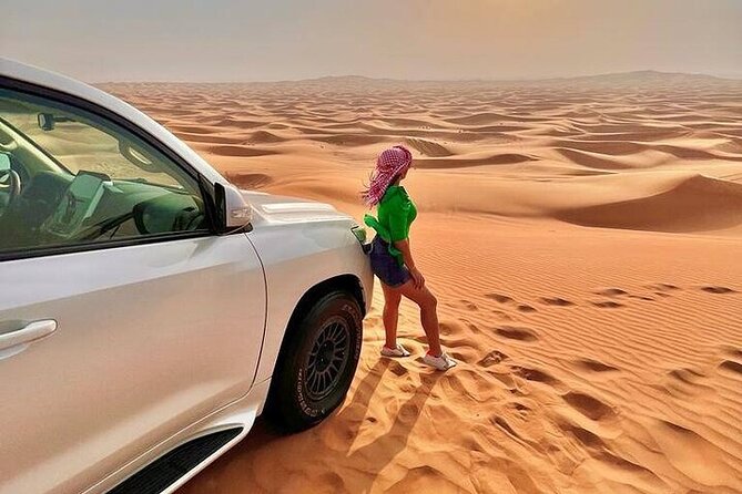 Desert Safari with Quad Bike Camel ride ,SandBoarding ,InalndSea - Dune driving brings the main burst of excitement