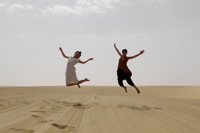 Desert Safari with Sandboarding and Inland Sea Private Tour - Sandboarding on Qatar’s soft dunes
