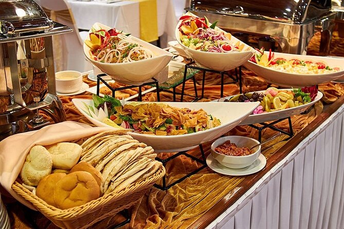 Dhow Cruise Dinner with Entertainment - From hotel pickup to the creek-side dock