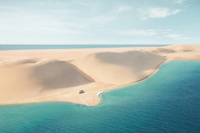Doha: Desert Safari: Dune Bashing, Quad Bikes & Camel Rides - Quad biking at Sealine Beach