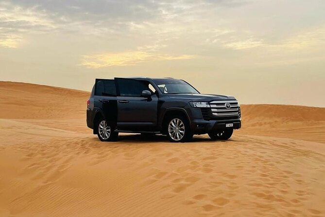 Doha: Desert Safari: Dune Bashing, Quad Bikes & Camel Rides - Camel riding and photos near the coast