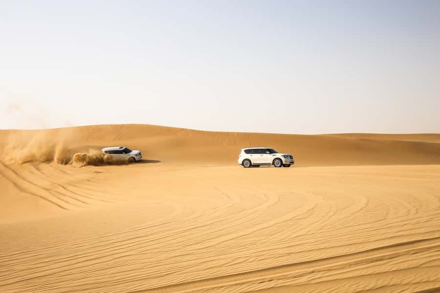 Doha: Desert Safari Dune Bashing, Sandboarding, & Camel Ride - Sandboarding without extra cost
