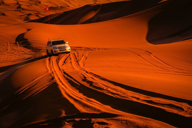 Doha Desert Safari Dune bashing,Sandboarding,CamelRide,Inland Sea - Sandboarding from the dunes