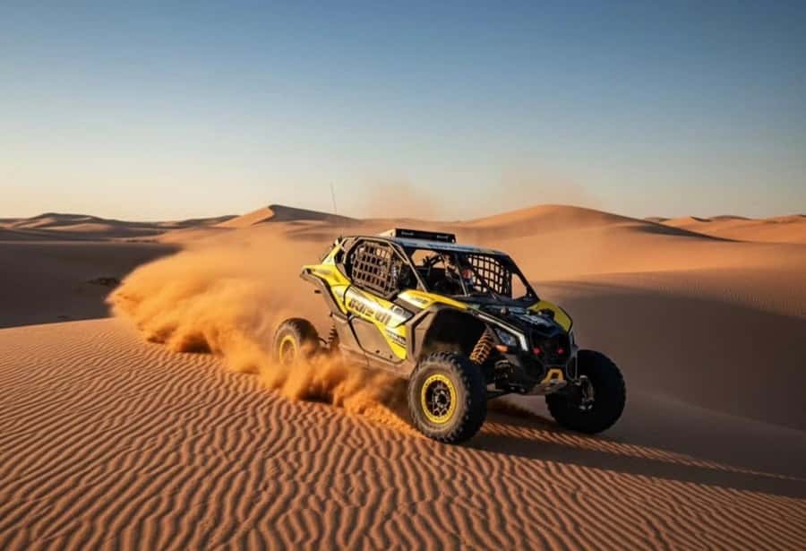 Doha: Desert Safari, Quad Bike, Camel Ride & Inland Sea Tour - Leaving Doha for the golden dunes