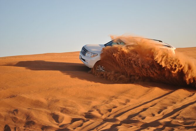 Doha: Desert Safari, Sand Boarding, Camel Ride & Inland Sea - Sandboarding and the rush of dune bashing