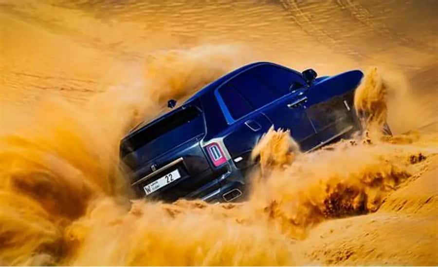 Doha: DesertSafari with Quad Bike, Camel Ride & Sandboarding - Dune bashing in a 4x4