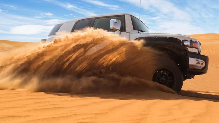 Doha: DesertSafari with Quad Bike, Camel Ride & Sandboarding - Quad biking on a dedicated track
