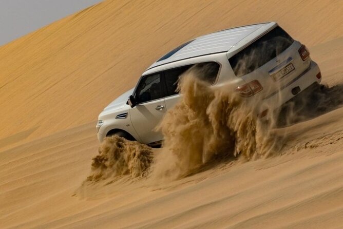 Doha Half Day Desert Safari Dune Bashing Camel Ride Sandboarding - Leaving Doha for Qatar’s open desert