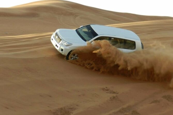 Doha Half Day Desert Safari Dune Bashing CamelRide & Sandboarding - A fast introduction to Qatar’s desert