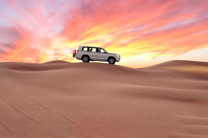 Doha Half Day Desert Safari with Camel Ride and Sand Boarding - Sandboarding near Khor Al Udaid