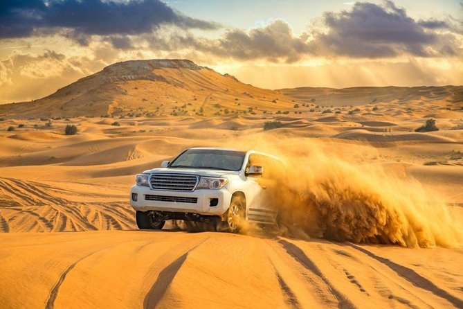 Doha : Half Day Desert Safari With SandBoarding and Camel Ride - The bumpy thrill of dune-bashing