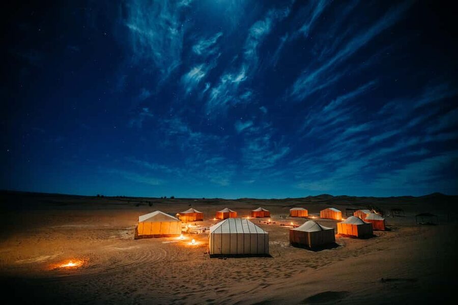 Doha: Overnight Desert Safari with Dinner and Breakfast - Camel rides and sandboarding near the dunes