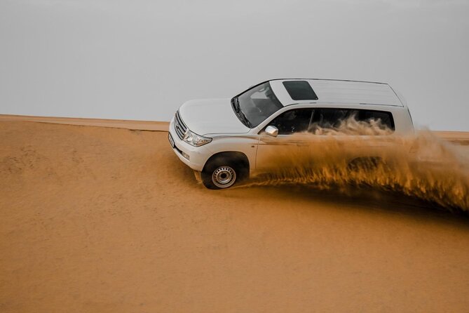 Doha Qatar ATV Quad Bike Buggy Desert Adventure and Camel Ride - Reaching the Inland Sea and Khor Al Adaid