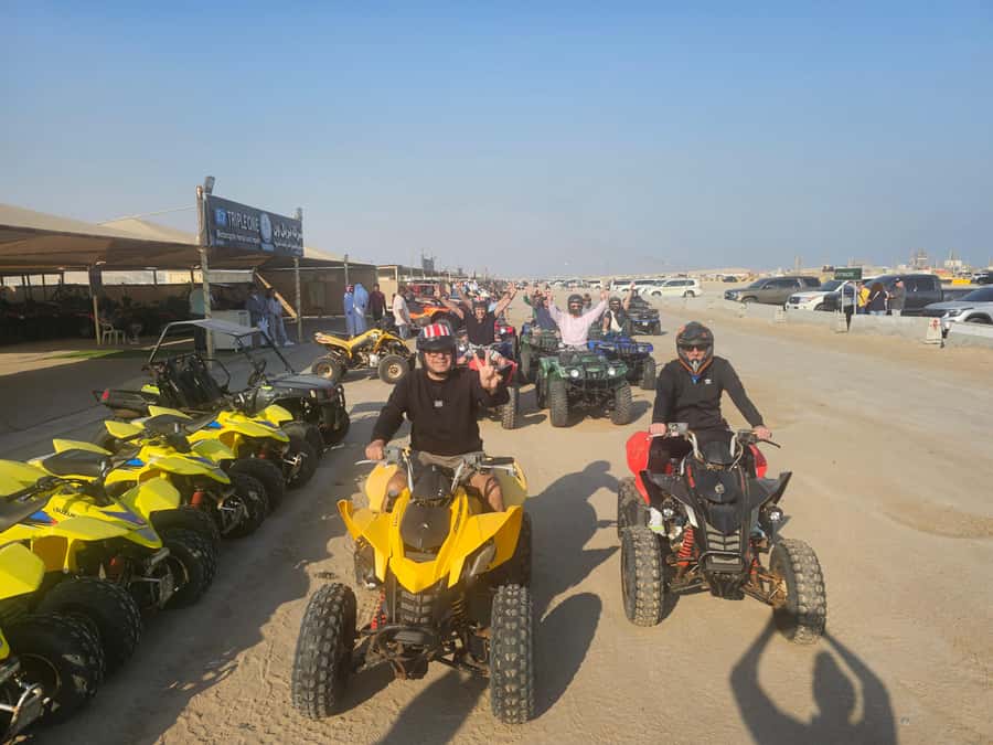 Doha: Quad Bike, Desert Safari, Buggy ride & inland sea tour - Camel ride and falcon photos: a short cultural pause