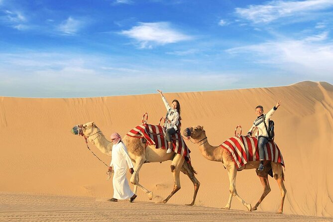 Doha Quad Bike, Dune Bashing, Camel Ride and Inland Sea Tour - Sandboarding gives you a simple desert challenge