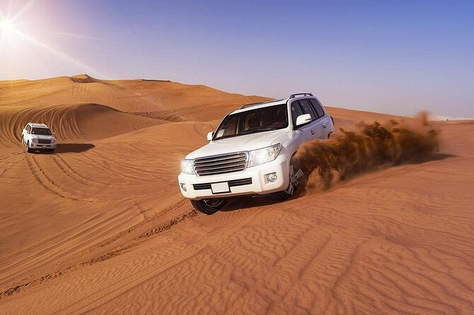 Doha: Quad Bike, Dune Bashing, Camel Ride & Inland Sea Tour - Camels, falcons, and a short Bedouin stop