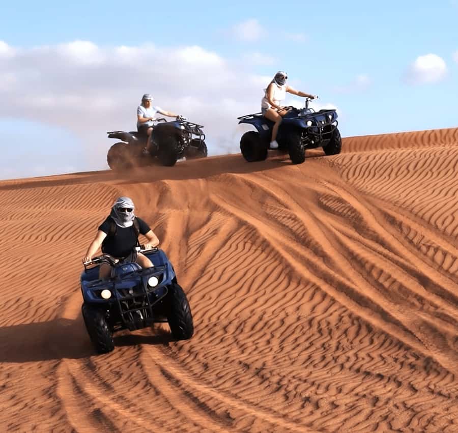 Doha Safari: ATV Ride, Dune Bashing, & Sandboarding Fun - Tea and a short camel ride at the local camp