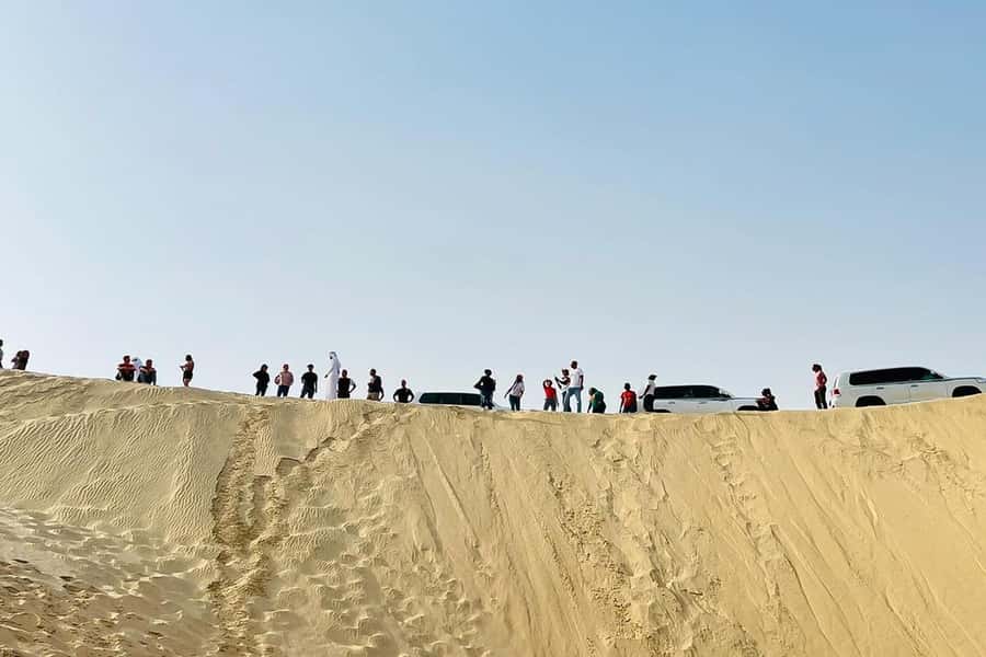 Doha Safari: ATV Ride, Dune Bashing, & Sandboarding Fun - Sandboarding for a quick final thrill