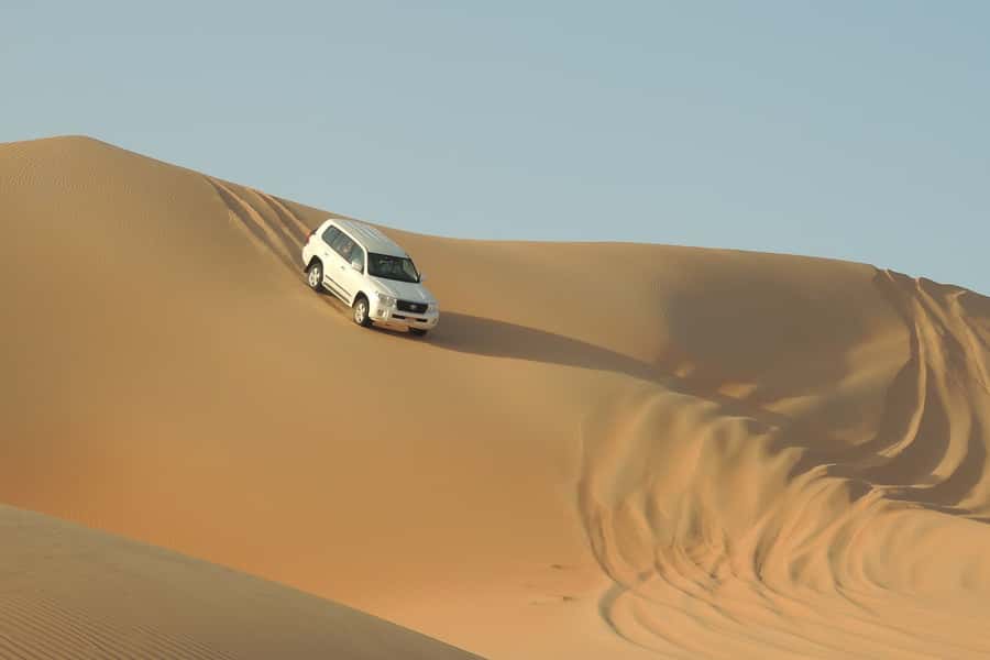 Doha Safari: ATV Ride, Dune Bashing, & Sandboarding Fun - Leaving Doha for the open sand