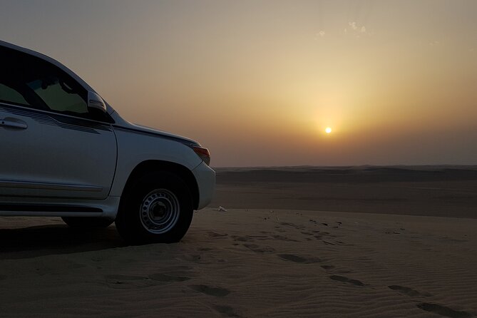 Doha: Sunrise /Sunset Desert Safari with Sand Boarding,Camel ride - Communication and guide expectations