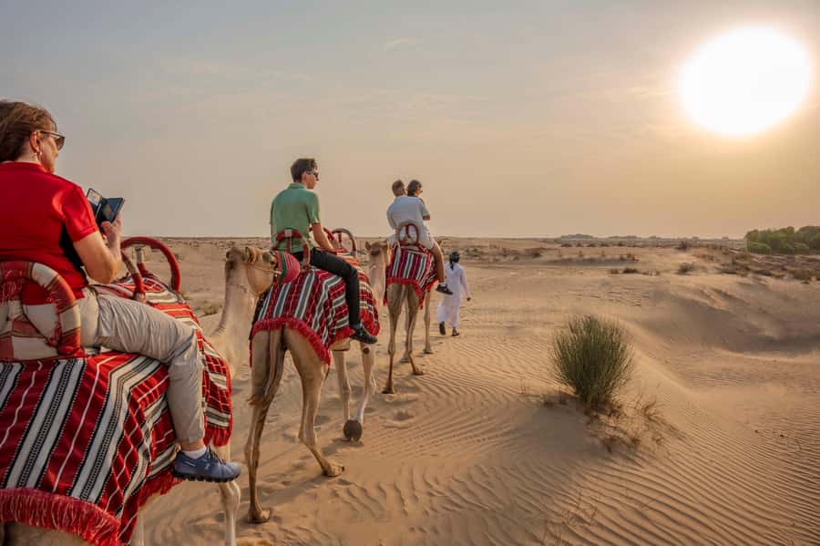 Dubai: Al Marmoom Oasis Camp Experience with Bedouin Dinner - Arriving at the Bedouin village with coffee and dates
