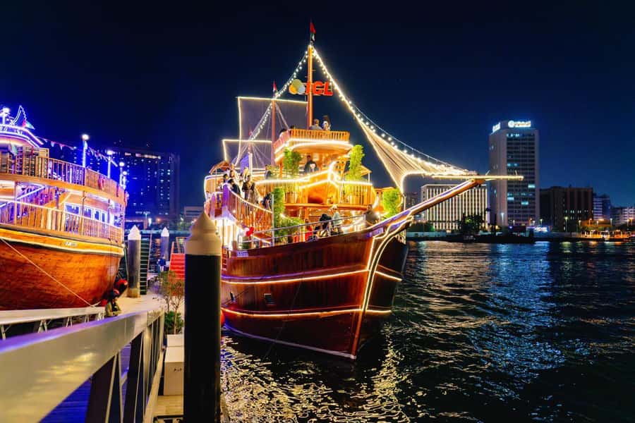 Dubai: Al Seef Largest Dhow Dinner Cruise with Live Show - Dinner while Dubai lights up