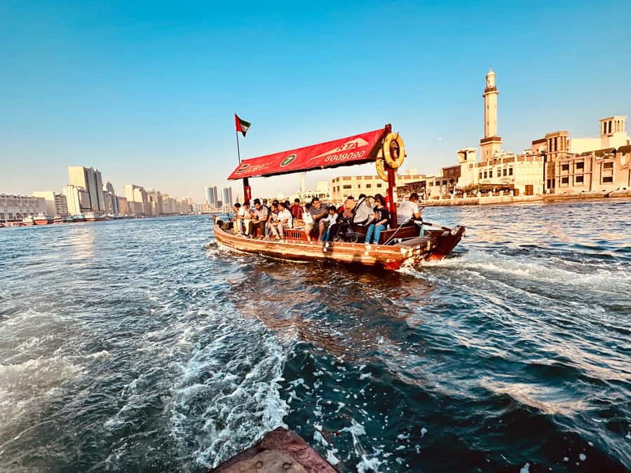 Dubai: Authentic Old Town, Souks, Tastings & Abra Boat Tour - Crossing Dubai Creek by traditional abra
