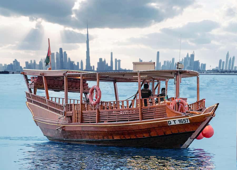 Dubai: Burj Khalifa Sunset on an Abra - Boarding a traditional wooden abra