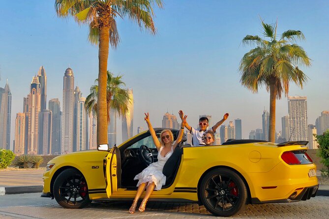 Dubai Cabrio Tour: Guided Tour of Top Sights in a Convertible Car - Dubai Marina brings towers and yachts