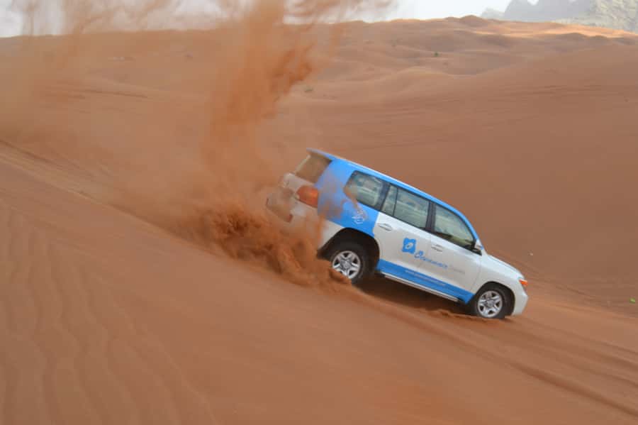 Dubai City Tour and Evening Desert Safari Combo - Day two: Lahbab’s red dunes and the thrill of dune bashing