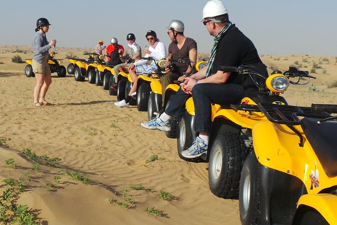Dubai Desert Afternoon Quad Safari with Camel Ride, BBQ Dinner and Belly Dancing - One afternoon, several sides of the Dubai desert