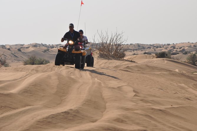Dubai Desert Afternoon Quad Safari with Camel Ride, BBQ Dinner and Belly Dancing - The Bedouin-style camp after dark