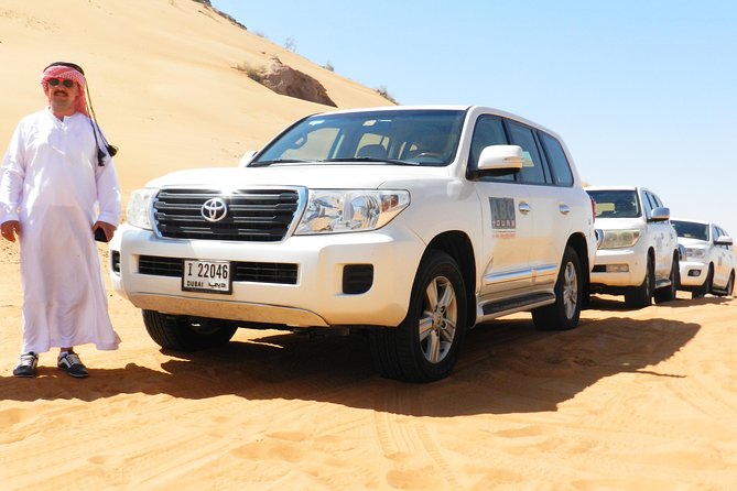 Dubai Desert BBQ Dinner, Camel Ride, Sandboarding and Live Shows - Leaving Dubai for the Majlis Desert Safari Camp