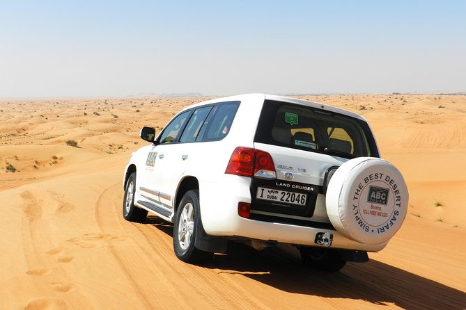 Dubai Desert BBQ Dinner, Camel Ride, Sandboarding and Live Shows - Arabic welcome, henna, and shisha at camp