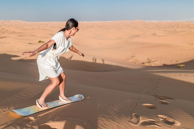 Dubai Desert Discovery: Red Dunes Safari, Sandboard & Camel Ride - Reaching the red dunes from Dubai, Sharjah, or Ajman