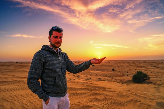 Dubai Desert Discovery: Red Dunes Safari, Sandboard & Camel Ride - Optional quad biking on the open sand