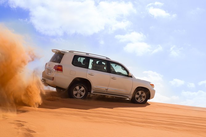 Dubai Desert Journey: Red Dunes Safari with BBQ in Bedouin Camp - Reaching Lahbab from Dubai