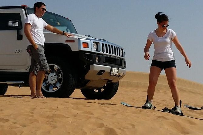 Dubai Desert Morning Tour in 4WD Vehicle: Camel Ride, Quad Bike Tour, Sandboarding, and Camel Farm - Guides, group size, and the human side