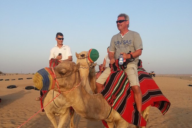 Dubai Desert Morning Tour in 4WD Vehicle: Camel Ride, Quad Bike Tour, Sandboarding, and Camel Farm - The camel farm is more photo stop than cultural visit