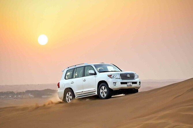 Dubai Desert Safari 20 mins Dune Bashing BBQ Live Show Camel Ride - Camel riding, sandboarding, and photo time