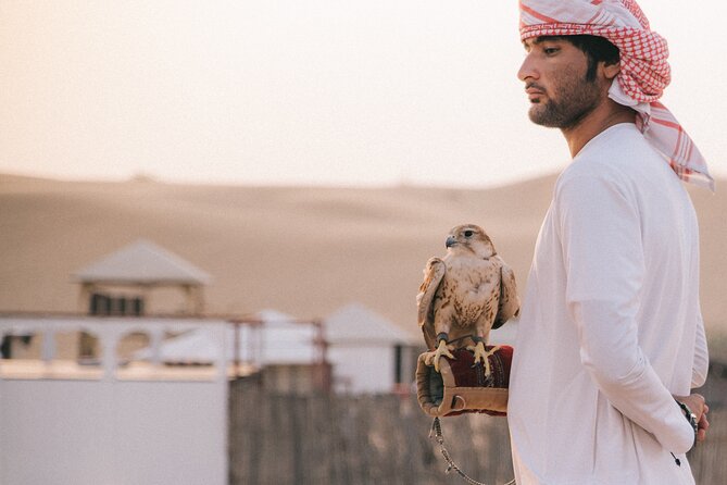 Dubai Desert Safari: 4x4 Dune Bashing, Camel Ride & BBQ Dinner - Tanaura, belly dancing, and the fire show